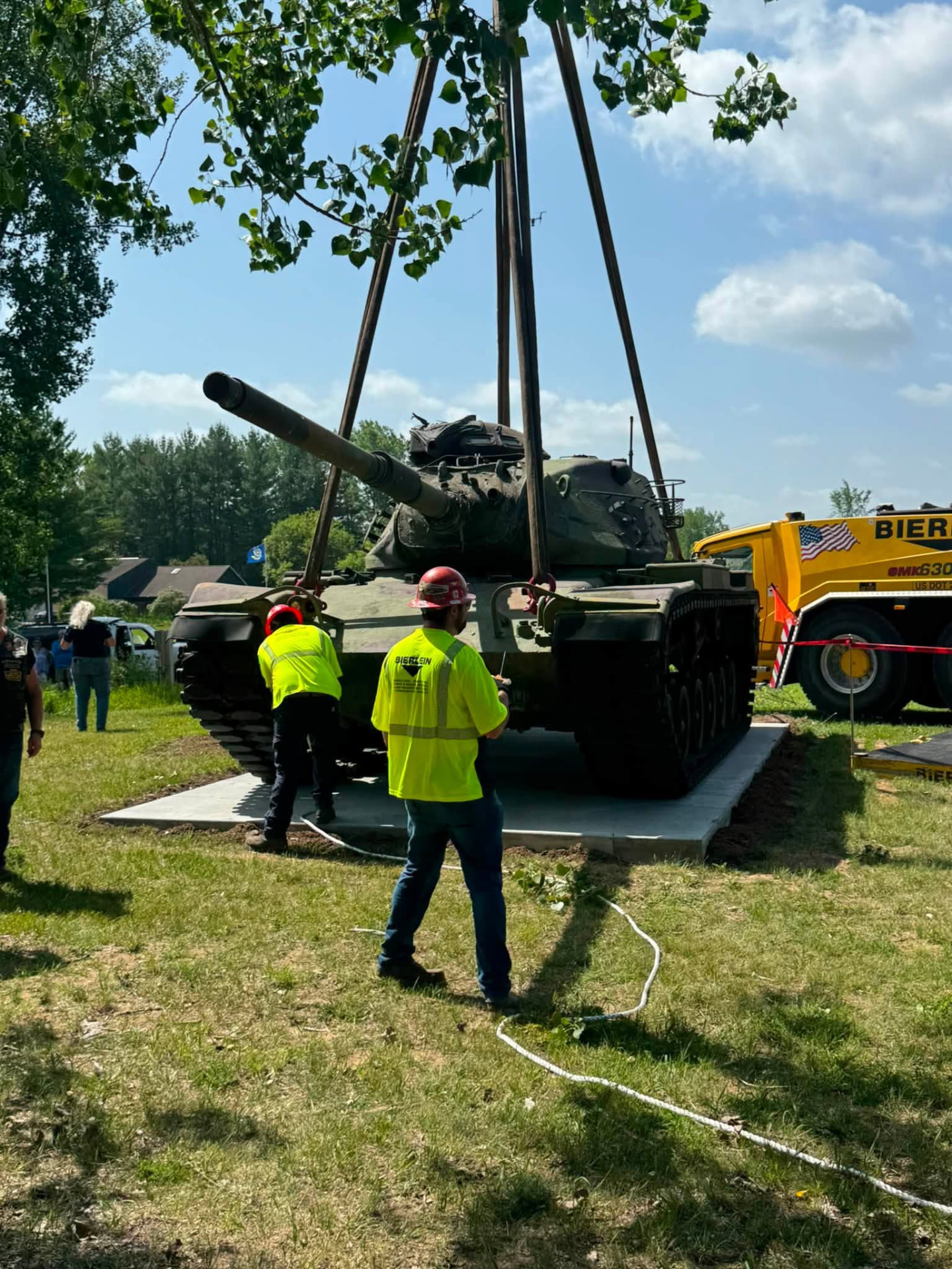The Vietnam-era tank being carefully placed on its permanent display pad at Sanford American Legion Post #443